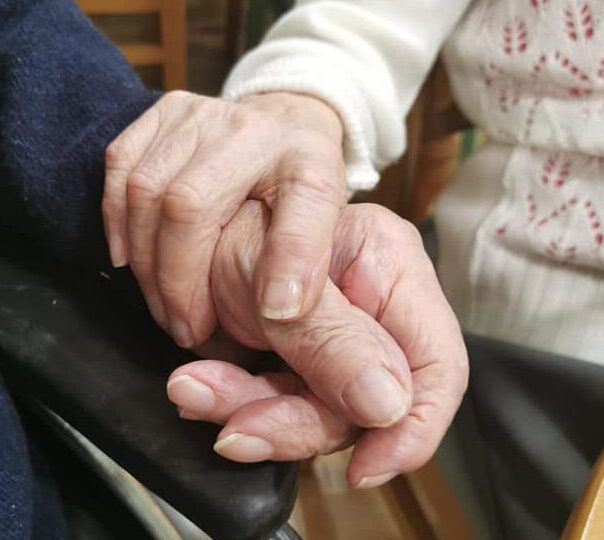 Hands holding