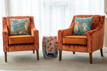 Two orange armchairs